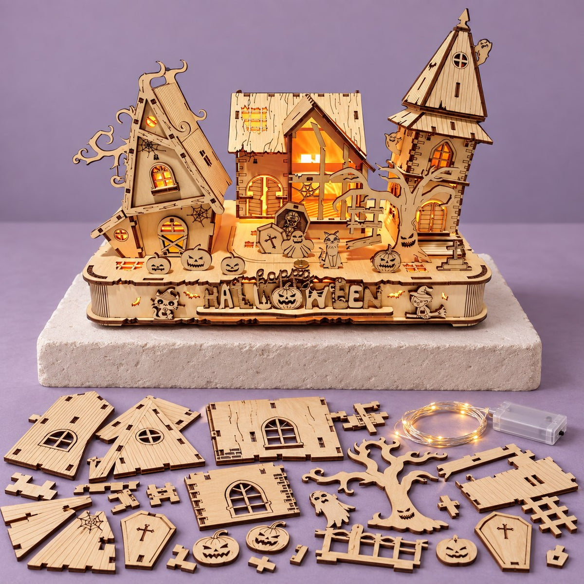 Assembled haunted house puzzle with wooden parts