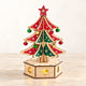 DIY wooden Christmas tree decoration with bells and illuminated snowflake base - hero view