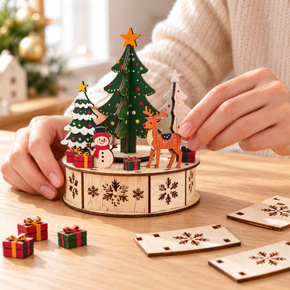Adult hands assembling the wooden Christmas forest scene